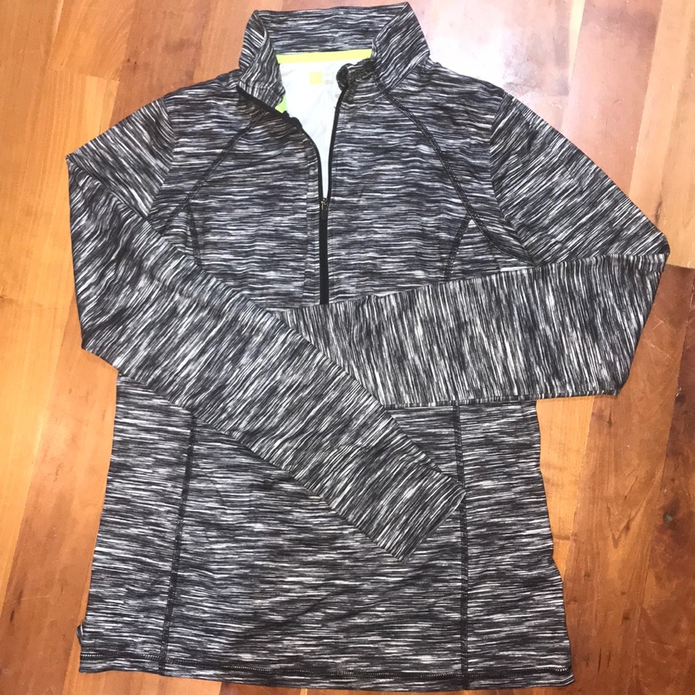 Semi fit Xersion front zip shirt.